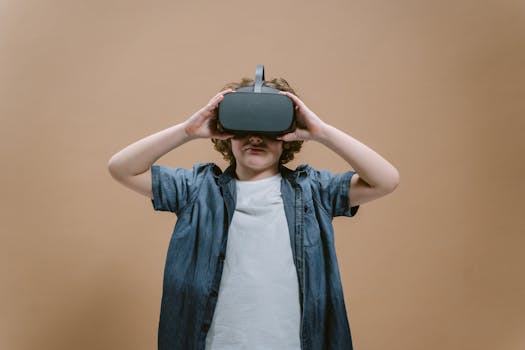 Child in studio using VR headset, engaging with modern technology on a plain background.